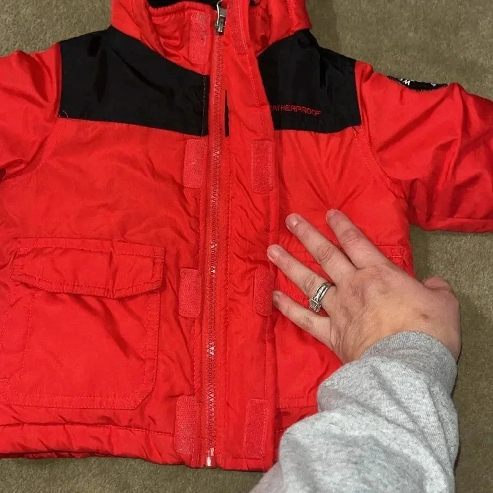 Weather proof red and black 12 month coat
